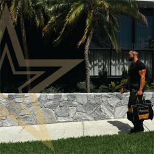 Stark Pest Solutions technician arriving on site with equipment for a residential pest inspection
